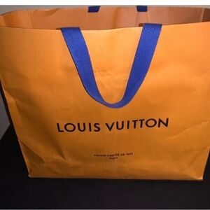 Two Large Louis Vuitton shopping bags